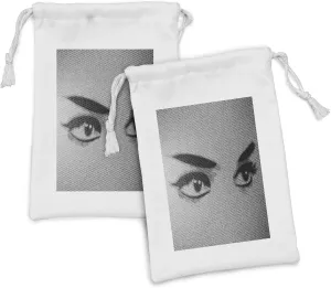 Ambesonne Eyelash Fabric Pouch Set of 2, Female Eyes Dramatic Looking Woman on Denim Texture Image Monochrome Grunge Display, Small Drawstring Bag for Toiletries Masks and Favors, 9" x 6", Grey Black